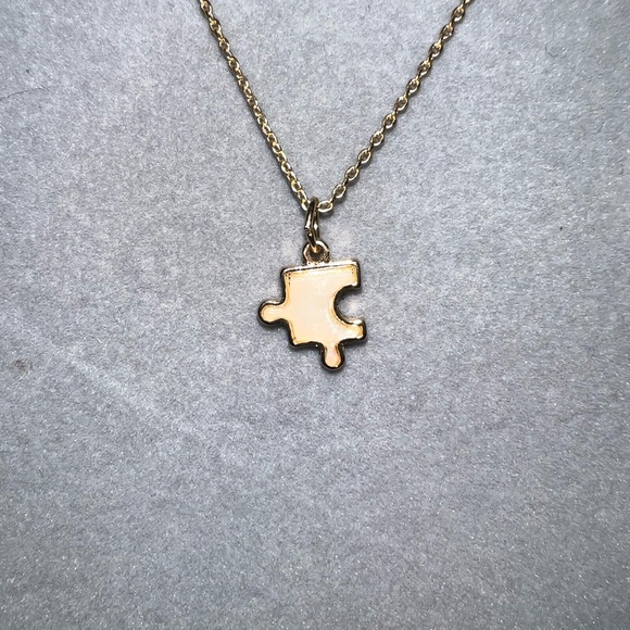 Sweet puzzle piece necklace. Made in honor of our Autistic loves. - Picture 1 of 4